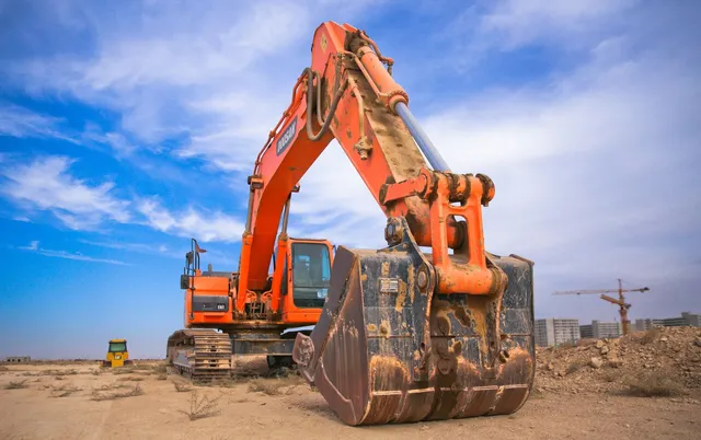 Excavator and heavy plant working on a construction earthworks site