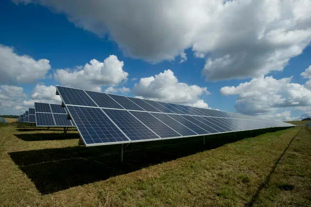 Rows of solar photovoltaic panels at a renewable energy installation